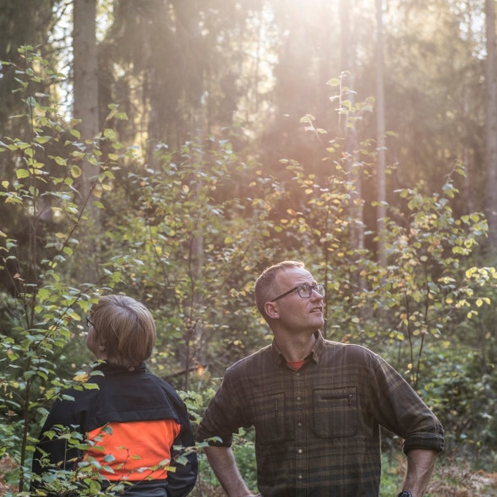 Two people in the forest