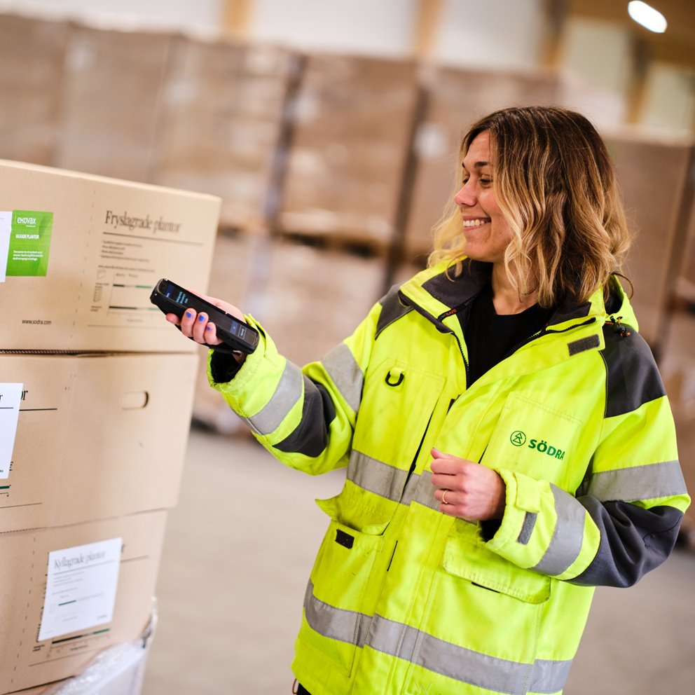 Woman standing in warehouse