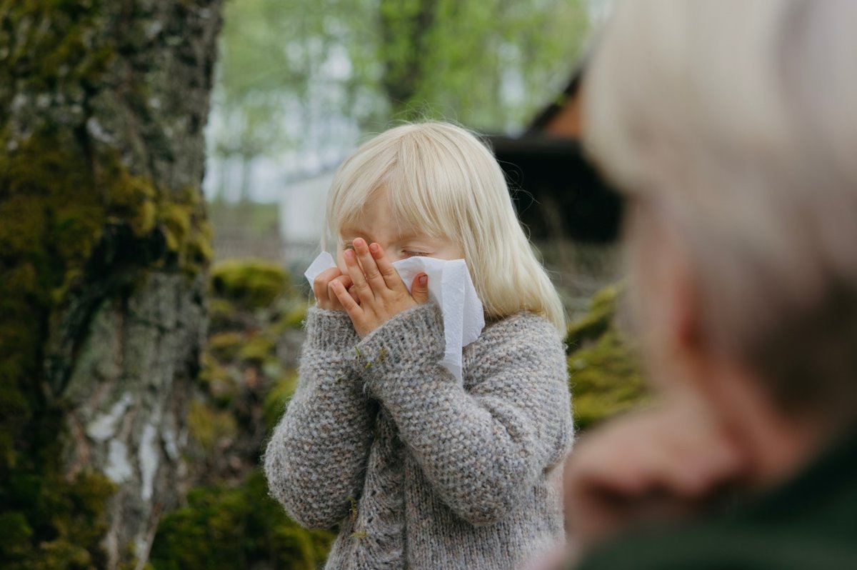 Child uses a tissue